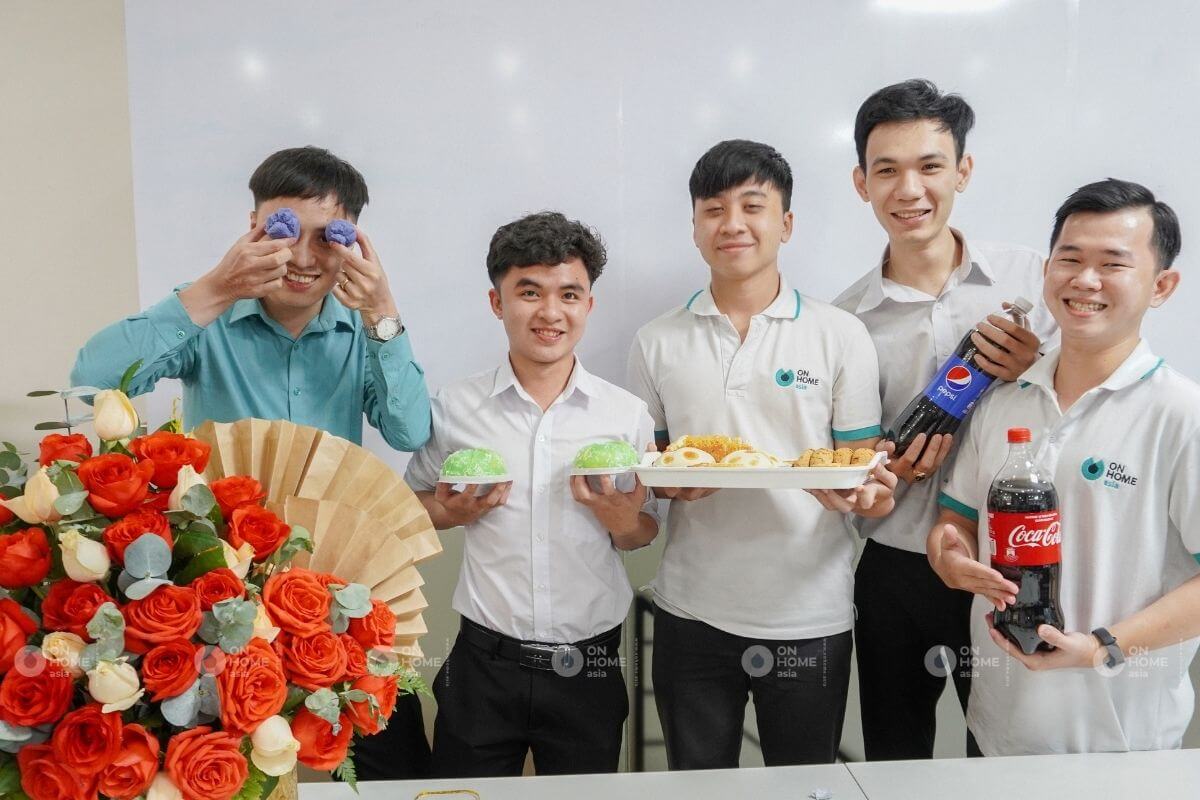 The male staff prepares a party for the female employees